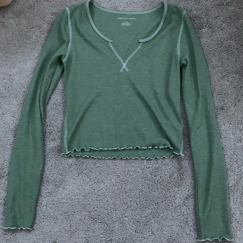 green long sleeve top